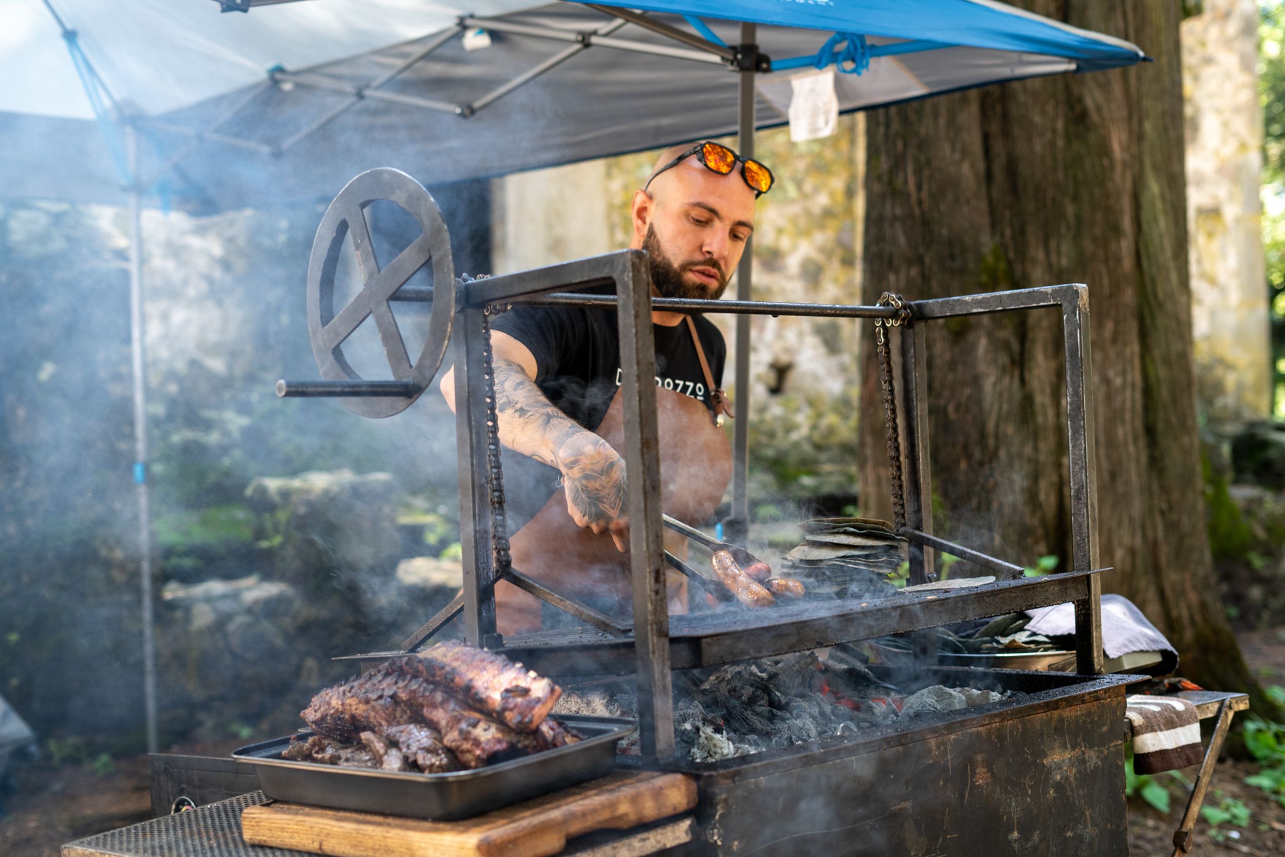 Food grilling over live fire at a private BBQ in Corfu